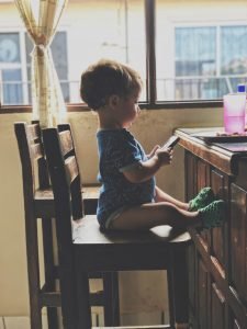 The Simple Secret a Baby Can Teach You About Eating baby holding iphone
